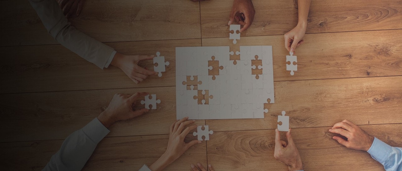 People putting a puzzle together