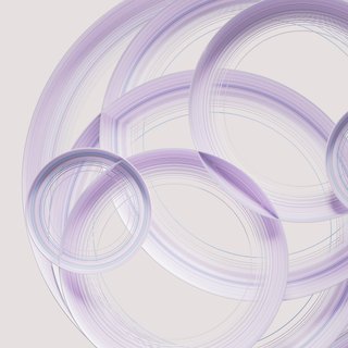 3D render of purple, white and blue circles intersecting each other over a warm grey background
