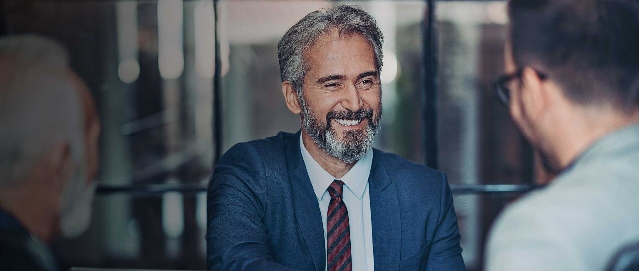 Two business people talking