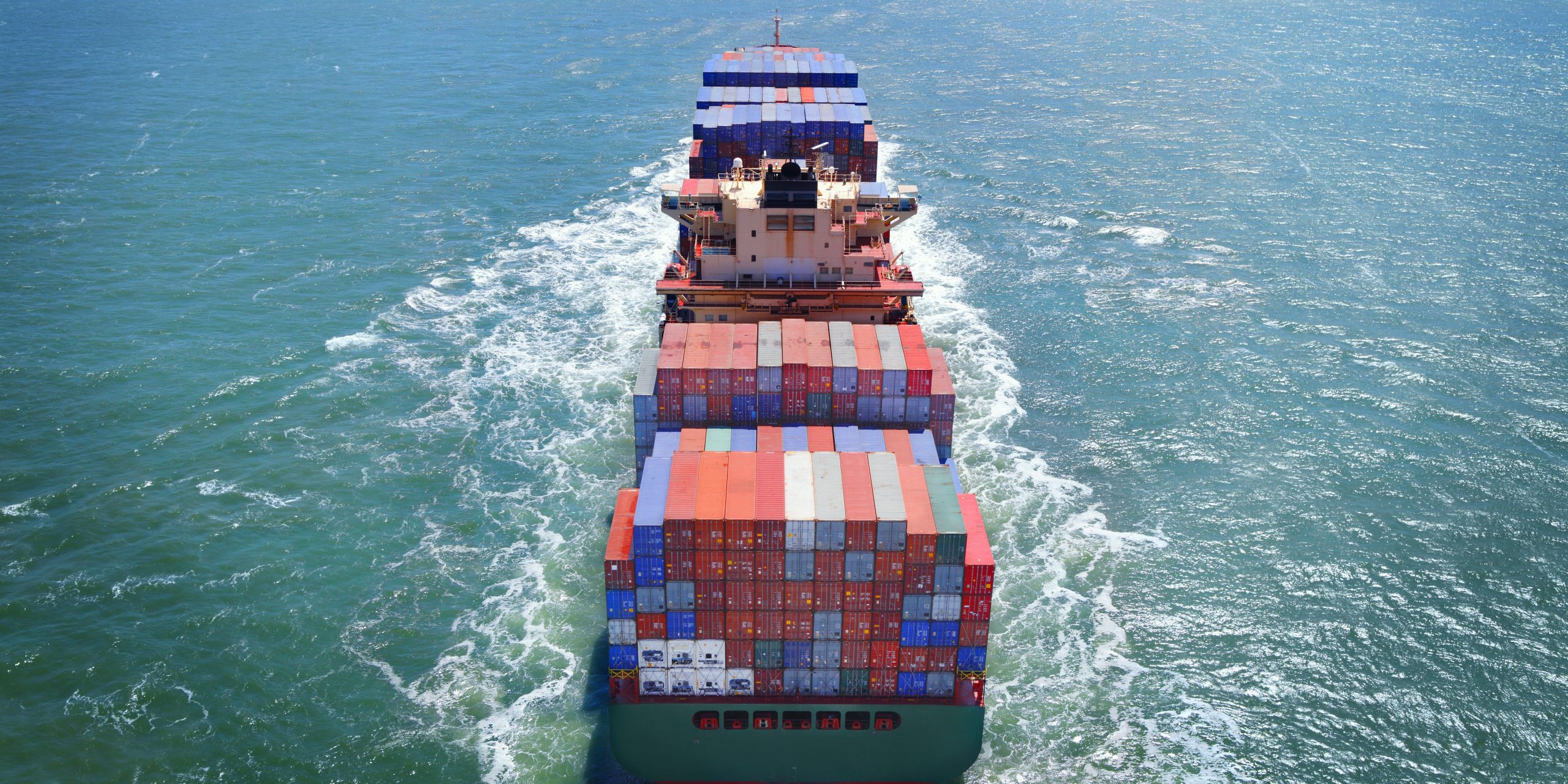 Cargo ship in blue sea