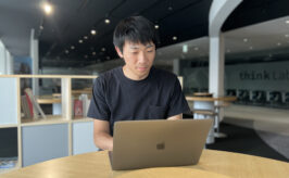 man working on laptop in IBM office in Japan