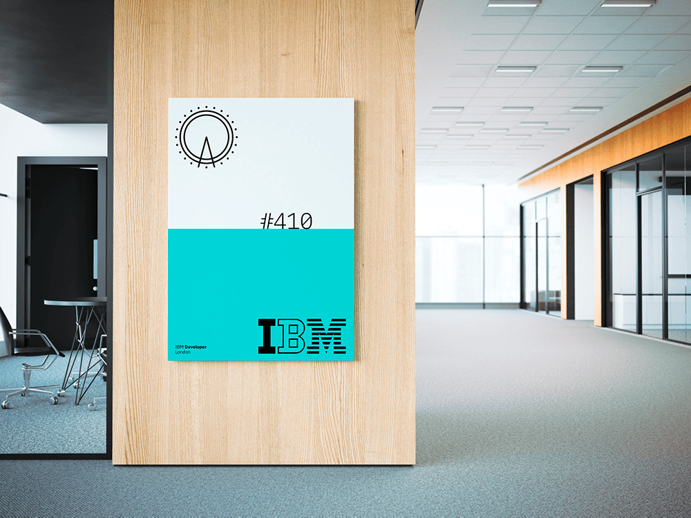 IBM Developer event poster displayed on office wall