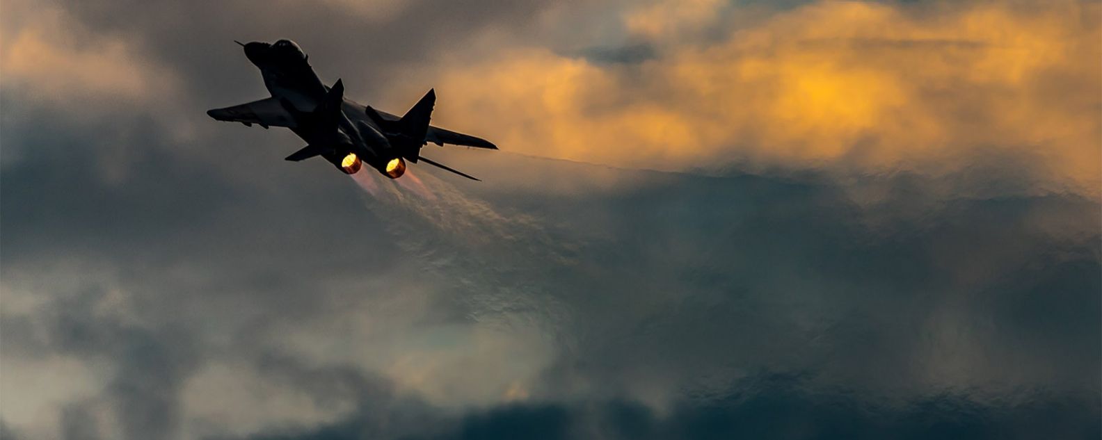 Polish Air Force MiG 29 Fulcrum fighter jet taking off at dawn