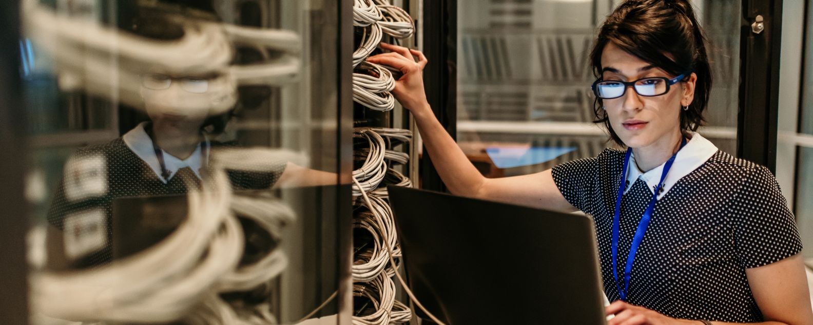 Person standing in server room