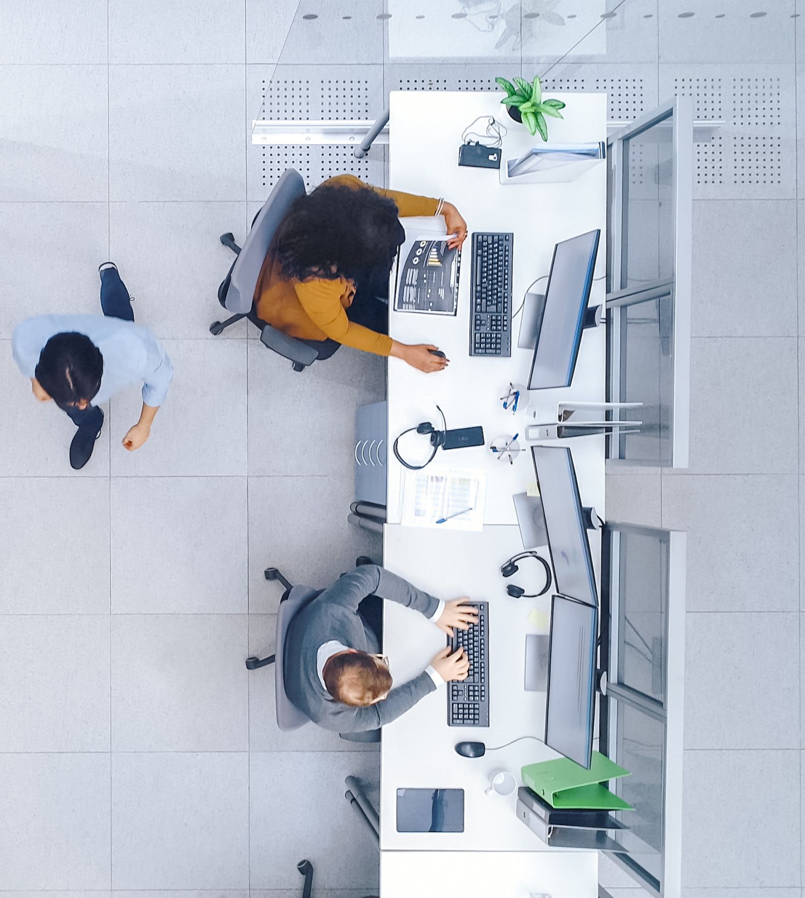 Overhead view of people working at computers