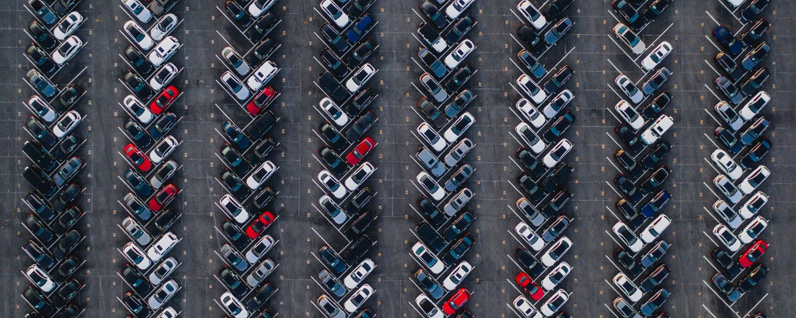 Aerial photo of cars in parking