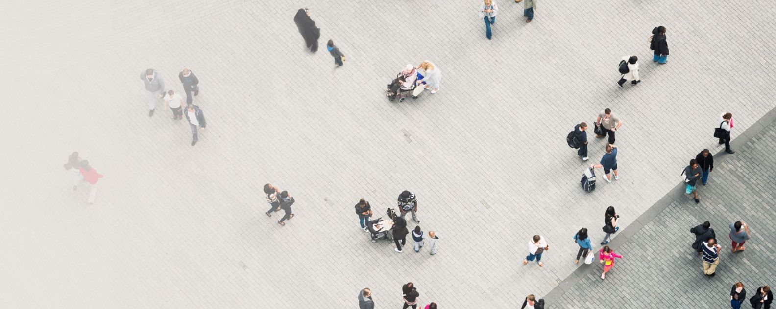 overhead view of pedestrians in a city