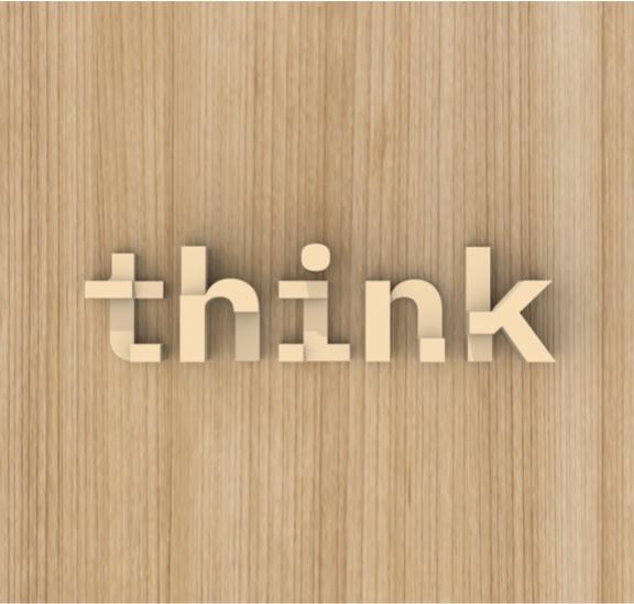 3-D Think® logo sculpture installed on wood wall 3-D Think® logo sculpture installed on wood wall