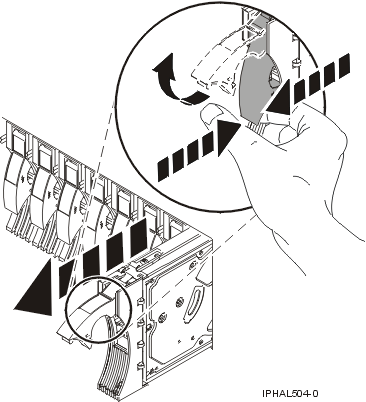 Graphic of removing a disk drive form the system unit.