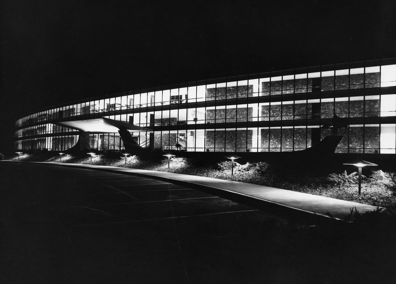 [↑] The IBM Research Center in Yorktown Heights, NY: Eero Saarinen’s design contrasted a spaceship-worthy glass exterior with a warm, organic stone wall inside. This balance of natural and the engineered is the backbone of IBM Plex.