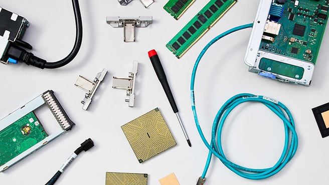 Overhead view of tools and components for electronics assembly
